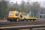 Sonstige/184878/ein-gleisarbeitsfahrzeug-arbeitet-am-morgen-vom Ein Gleisarbeitsfahrzeug arbeitet am Morgen vom 13.3.2012 in Aachen-West bei Wolken.