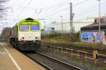 Class 66/174660/die-class-66-6605-von-captrain  Die Class 66 6605 von Captrain durchfhrt als Lokzug aus Herzogenrath kommend den Bahnhof Kohlscheid in Richtung Aachen-West bei Wolken am 6.1.2012.