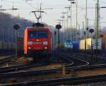 BR 145/178238/145-036-0-von-railion-faehrt-mit 145 036-0 von Railion fhrt mit einem LKW-Ambrogio-Zug aus Muizen(B) nach Gallarate (I) bei Ausfahrt in Aachen-West in Richtung Kln bei der Wintersonne am 28.1.2012.
