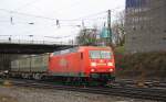 BR 145/180653/145-038-6-von-railion-kommt-mit  145 038-6 von Railion kommt mit einem LKW-Ambrogio-Zug aus Gallarate (I) nach Muizen(B) und fhrt in Aachen-West ein bei Regenwetter am 15.2.2012
