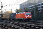 BR 185/168521/die-185-149-2-db-kommt-mit Die 185 149-2 DB kommt mit einem KLV-Zug  aus Richtung Kln und fhrt in Aachen-West ein bei Sonne.
20.11.2011