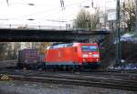 BR 185/181862/185-148-4-db-kommt-mit-einem 185 148-4 DB kommt mit einem KLV-Zug aus Richtung Kln und fhrt in Aachen-West ein bei Sonne am 20.2.2012.