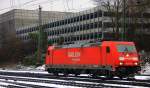 BR 185/240193/185-310-0-von-railion-rangiert-in 185 310-0 von Railion rangiert in Aachen-West im Schnee am 9.12.2012. 