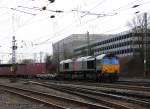 Crossrail/176144/die-class-66-de6309-von-dlc Die Class 66 DE6309 von DLC Railways kommt mit einem Containerzug aus Belgein und fhrt in Aachen-West ein bei Sonne am 14.1.2012.
