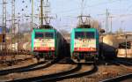  Die Cobra 2805 f�hrt mit einem Kesselzug von Aachen-West nach Antwerpen-BASF und auf dem Nebengleis steht die Cobra 2837 mit einem Coilzug und wartet auf die Abfahrt nach K�ln-Gremberg bei strahlend blauem Himmel am 27.1.2012.